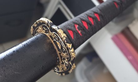 Tsuba "Goruden Raion"